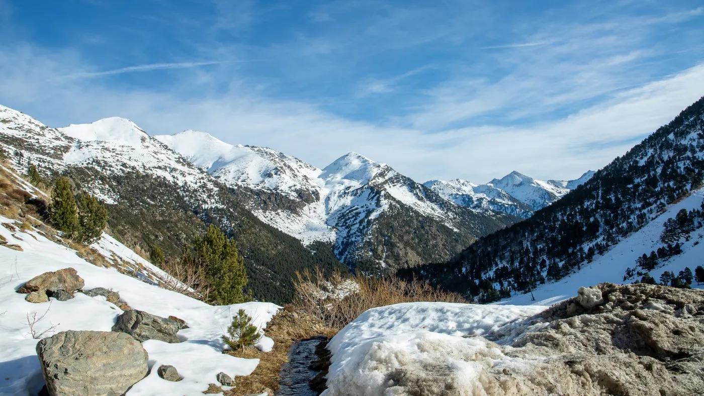 Captured in Ordino, Andorra, this stunning winter scene showcases majestic snowcapped mountains.