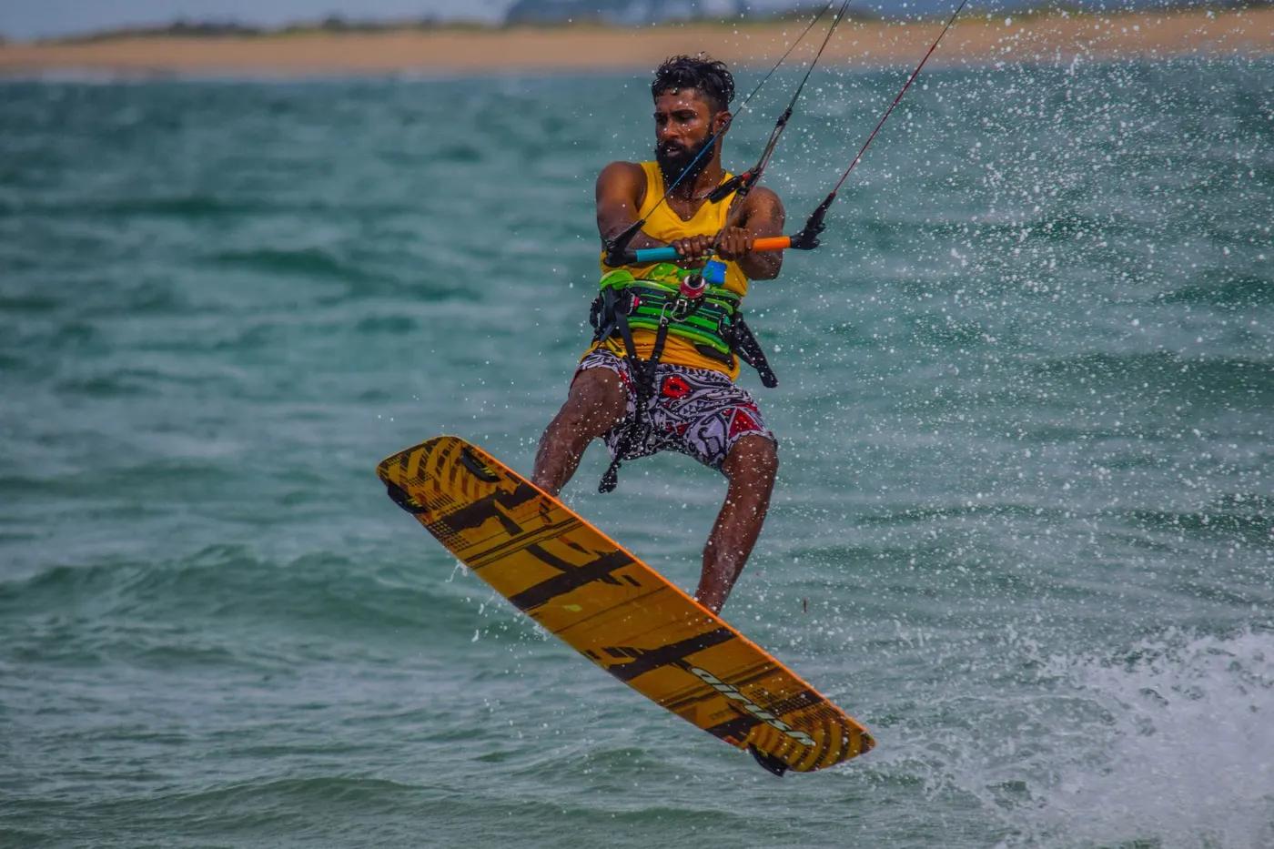Dynamic kiteboarding scene capturing thrilling action in Kalpitiya, Sri Lanka.